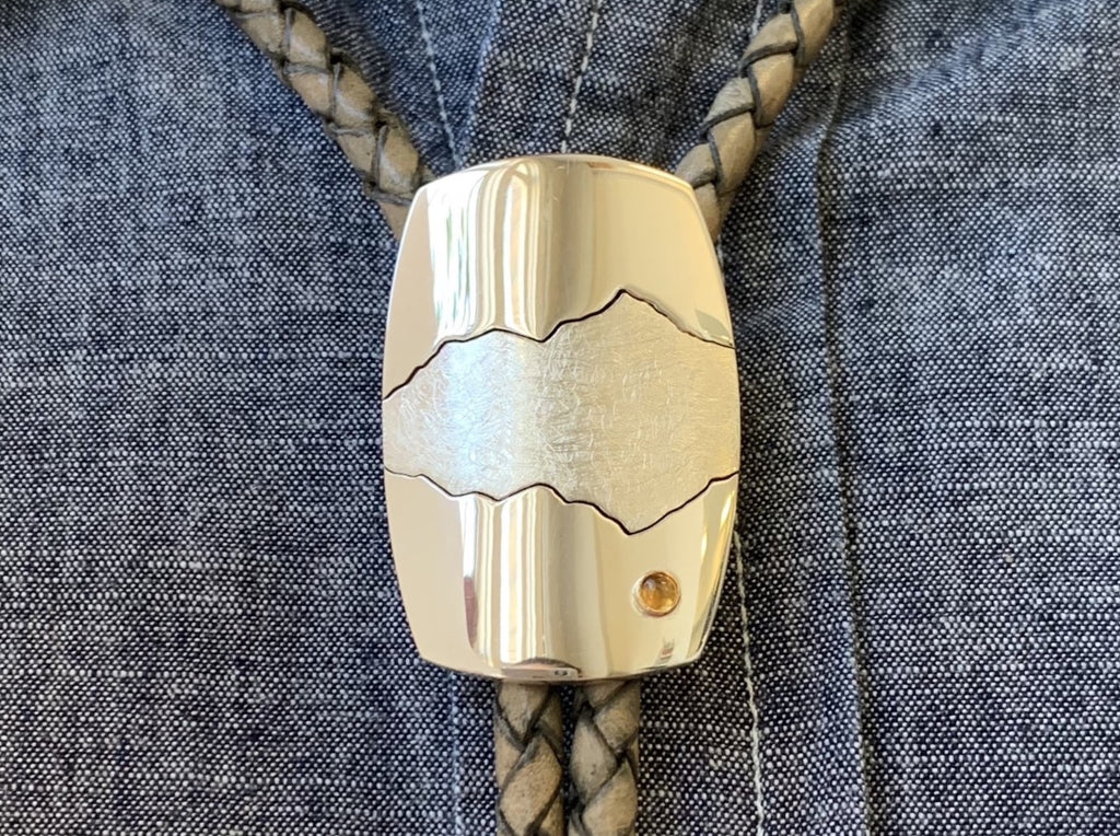 Handmade to order custom mountain bolo tie featuring your favorite mountain range