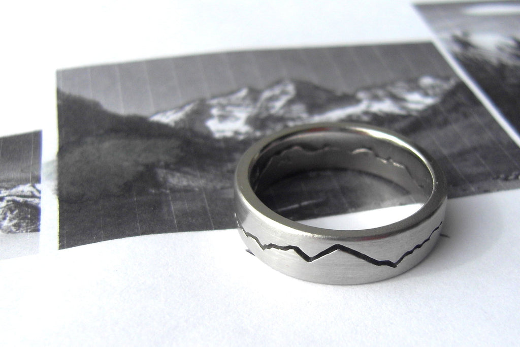 Custom Modern Mountain Ring handmade in Seattle WA.  Each custom mountain ring is made to order with your personalized mountain range in either recycled silver, gold or platinum.  Michelle Lenáe's signature Mountain Collection established in 2009