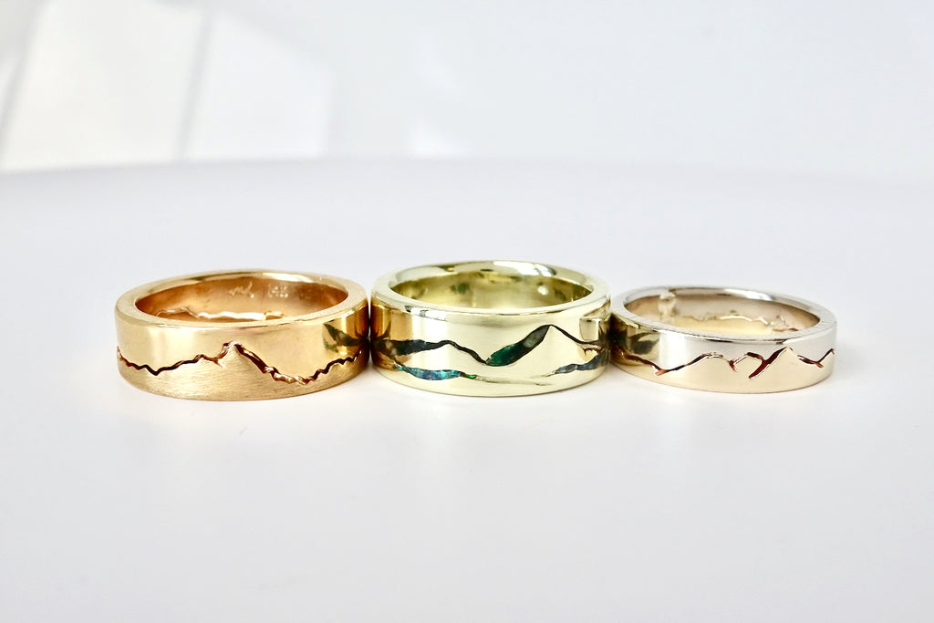 Interlocking, Sea to Sky & Mixed Gold Mountain Ring.  Each ring is customizable for a true personalized one of a kind look.