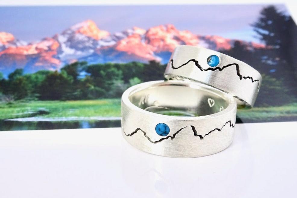 Couples silver mountain wedding ring set with turquouise moon.  Each mountain ring features your favorite mountain in your choice of recycled silver, gold or platinum.  Made to order from Seattle WA.