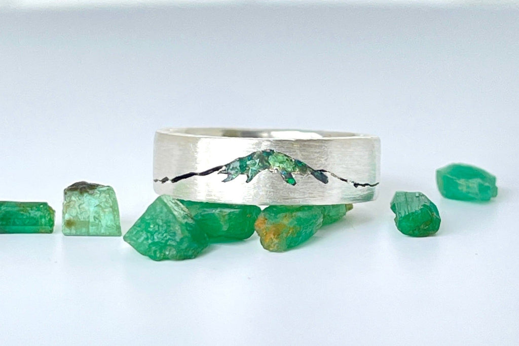 Close-up of silver-palladium Mount Fuji Summit ring with emerald inlay 