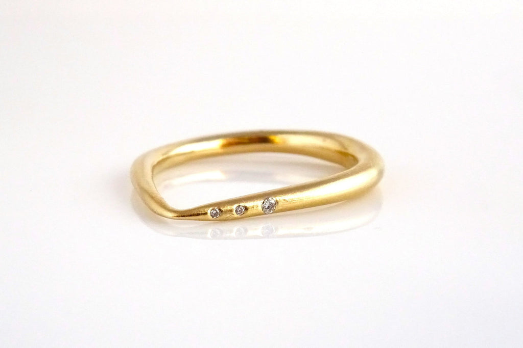 Mountain Peak Ring with 3 flushed set diamonds.   Made to order from Seattle WA