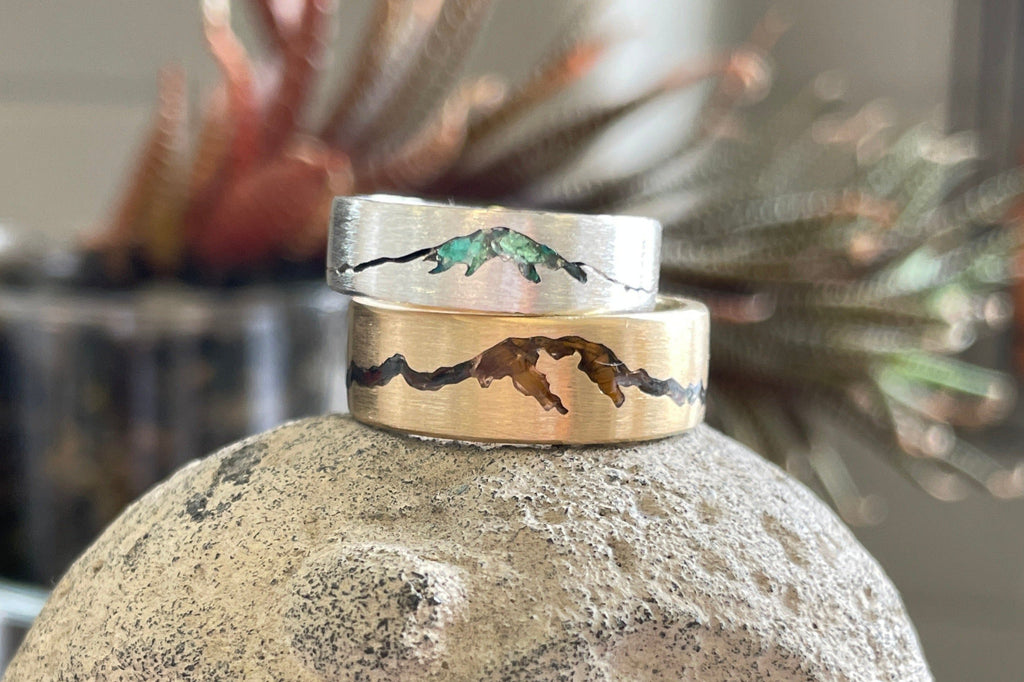 Handcrafted summit inlay mountain rings featuring Mt. Fuji and Mt. Rainier – custom mountain-inspired jewelry by Michelle Lenae Jewelry.