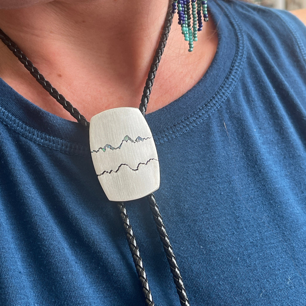 Teton Bolo Tie handmade to order with your choice of inlay.   This bolo features chipped opal inlay.  
