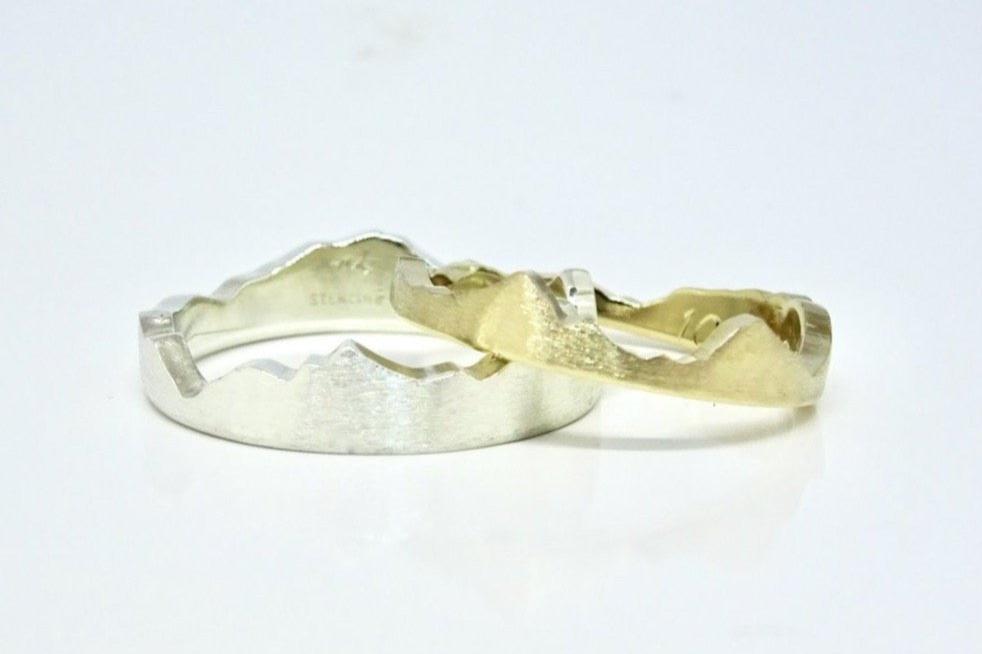 Custom Interlocking Mountain Ring handcrafted with your choice of recycle material and mountain range.  Choose from either a brush or polish finish
