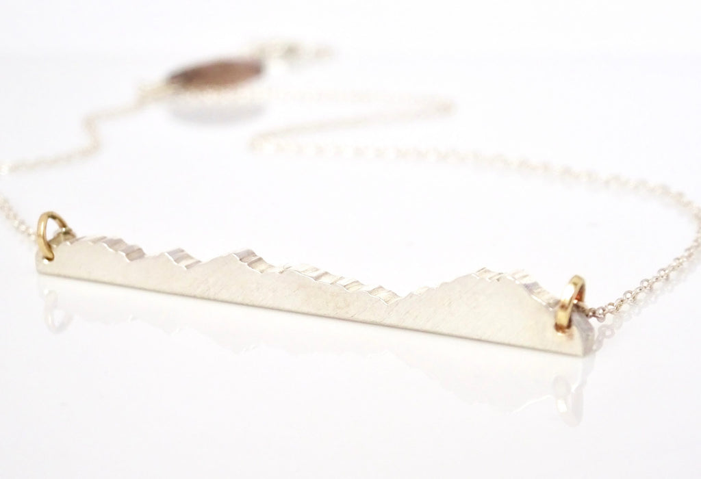 Contour Mountain Bar Necklace features the mountain range and material of your choice
