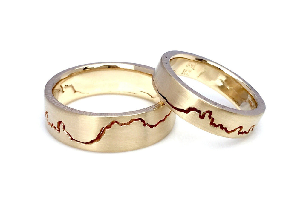 Mountain Ring Wedding Set by Michelle Lenae Jewelry.  Handcrafted rings in your choice of recycled metal featuring the mountain range of your choice.  