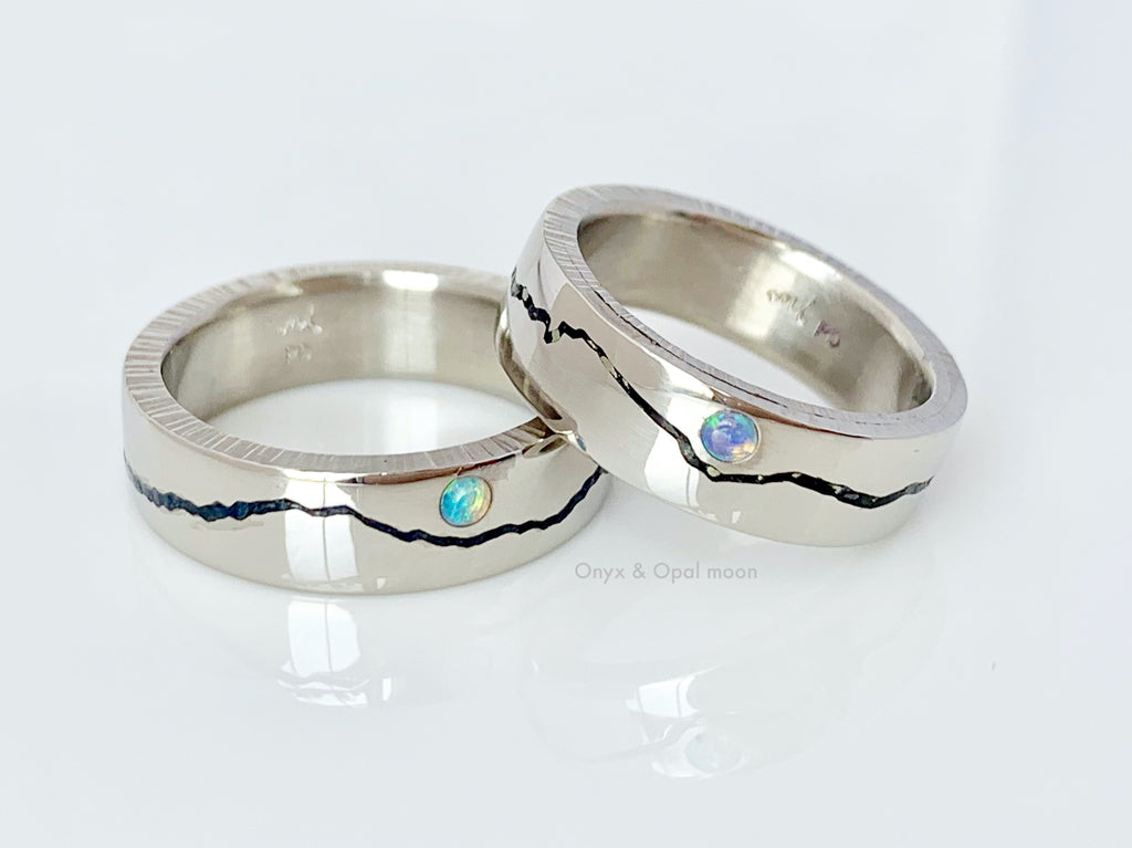 Gemstone Mountain Inlay Ring set handcrafted with your choice of recycled material and precious gemstone.   This set features onyx inlay with a flush set opal moon. Each personalized mountain ring made to order by Michelle Lenáe Jewelry, original mountain inspired designs in Seattle WA.  